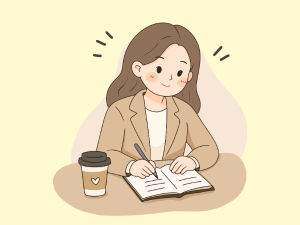 ノートに書き溜めている女性